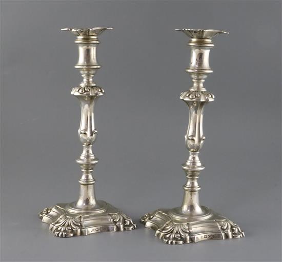A pair of early Victorian silver candlesticks, by Henry Wilkinson & Co, weighted.